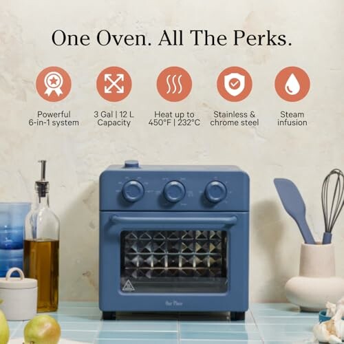 Blue oven with features listed: 6-in-1 system, 3 gal capacity, heats up to 450°F, stainless steel, steam infusion.