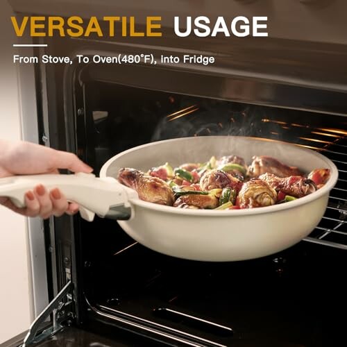 Hand placing a white pan with food into an oven, showcasing versatile cookware usage.